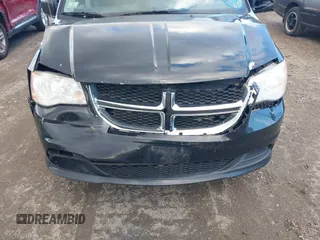 2014 Dodge Grand Caravan SXT with VIN 2C4RDGCG4ER337202, listed as a IAAI auction lot 40781755 with 258,524 mi miles and . Bid and sale history available at DreamBid. Image 12.