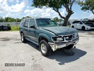 1997 Ford Explorer XLT с VIN 1FMDU32PXVUD09813, выставлен на аукционе Copart как лот 61066325 с пробегом 222 538 миль миль и Списание • Salvage title. История ставок и продаж доступна на DreamBid. Изображение 14.