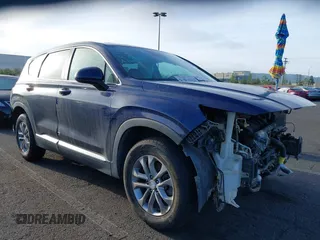 2019 Hyundai Santa Fe SE z VIN 5NMS23AD8KH096209, wystawiony jako IAAI lot #42235035 z przebiegiem 76 543 mil mil oraz . Historia ofert i sprzedaży dostępna na DreamBid. Obrazek 1.