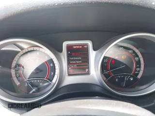 2015 Dodge Journey American Value z VIN 3C4PDCAB2FT637391, wystawiony jako IAAI lot #42354094 z przebiegiem 130 743 mil mil oraz . Historia ofert i sprzedaży dostępna na DreamBid. Obrazek 7.