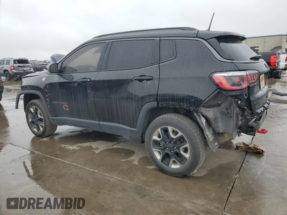 2018 Jeep Compass Trailhawk with VIN 3C4NJDDB6JT456305, listed as a Copart auction lot 44175405 with 124,636 mi miles and Salvage Title. Bid and sale history available at carsss.com. Image 2.