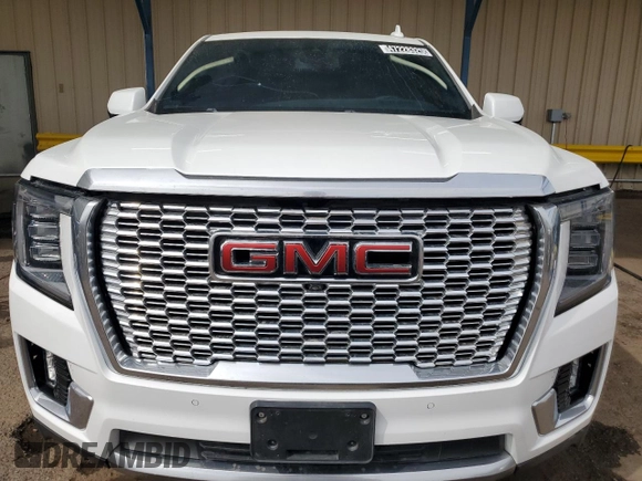 2023 GMC Yukon Denali with VIN 1GKS1DKL1PR239104, listed as a Copart auction lot 47228325 with 64,922 mi miles and Clean Title. Bid and sale history available at carsss.com. Image 5.