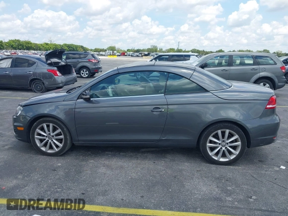 2014 Volkswagen Eos Sport with VIN WVWBW8AH2EV000313, listed as a IAAI auction lot 42333112 with 106,125 mi miles and . Bid and sale history available at DreamBid. Image 14.
