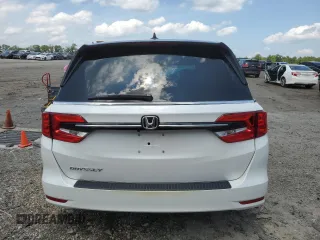 2023 Honda Odyssey EX-L с VIN 5FNRL6H68PB025508, выставлен на аукционе Copart как лот 60060725 с пробегом 10 203 миль миль и Списание • Salvage title. История ставок и продаж доступна на DreamBid. Изображение 6.