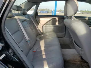 2001 Toyota Avalon XL z VIN 4T1BF28B61U175674, wystawiony jako Copart lot #49913765 z przebiegiem 170 245 mil mil oraz Tytuł czysty. Historia ofert i sprzedaży dostępna na DreamBid. Obrazek 10.
