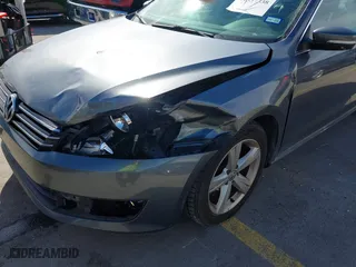 2013 Volkswagen Passat SE with VIN 1VWBP7A32DC144639, listed as a IAAI auction lot 41337338 with 147,878 mi miles. Bid and sale history available at carsss.com. Image 6.