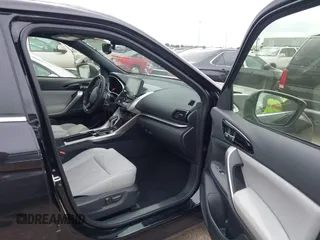 2024 Mitsubishi Eclipse Cross SE with VIN JA4ATWAA9RZ077782, listed as a IAAI auction lot 42136122 with 19,151 mi miles and . Bid and sale history available at DreamBid. Image 5.