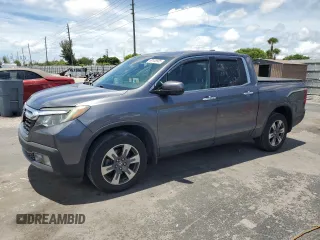 2017 Honda Ridgeline RTL-E with VIN 5FPYK3F74HB027130, listed as a Copart auction lot 60146905 with 99,964 mi miles and Salvage title. Bid and sale history available at DreamBid. Image 1.