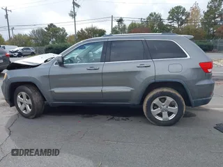 2012 Jeep Grand Cherokee Laredo with VIN 1C4RJFAG8CC298268, listed as a IAAI auction lot 40787833 with 206,486 mi miles. Bid and sale history available at carsss.com. Image 13.