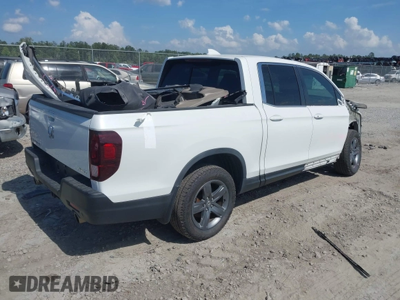 2022 Honda Ridgeline RTL with VIN 5FPYK3F51NB025152, listed as a IAAI auction lot 42325957 with 54,632 mi miles and . Bid and sale history available at DreamBid. Image 4.
