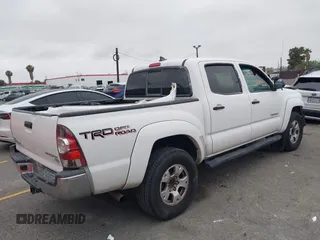 2014 Toyota Tacoma PreRunner z VIN 3TMJU4GN3EM170360, wystawiony jako IAAI lot #42438394 z przebiegiem 223 101 mil mil oraz . Historia ofert i sprzedaży dostępna na DreamBid. Obrazek 4.