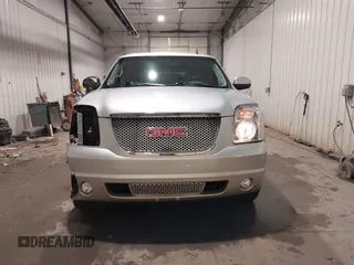 2014 GMC Yukon Denali with VIN 1GKS2EEF0ER134804, listed as a IAAI auction lot 41582709 with 142,192 mi miles. Bid and sale history available at carsss.com. Image 13.