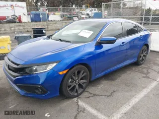 2021 Honda Civic Sedan Sport with VIN 19XFC2F89ME202942, listed as a IAAI auction lot 41512055 with 70,537 mi miles. Bid and sale history available at carsss.com. Image 2.