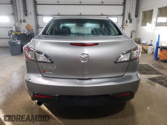 2010 Mazda 3 i SV with VIN JM1BL1SF0A1332815, listed as a Copart auction lot 87484534 with 121,187 mi miles and Salvage Title. Bid and sale history available at DreamBid. Image 6.