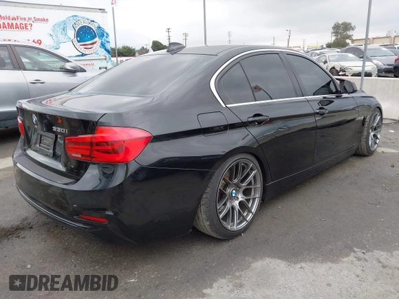 2018 BMW 3 Series 330i xDrive with VIN WBA8D9G57JNU67415, listed as a IAAI auction lot 41513343 with 98,714 mi miles. Bid and sale history available at carsss.com. Image 4.