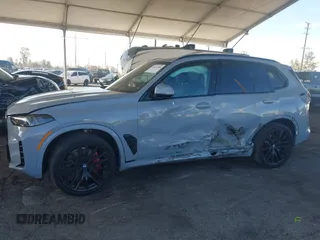 2025 BMW X5 sDrive40i with VIN 5UX13EU06S9Y55088, listed as a IAAI auction lot 41621580 with 1 mi miles. Bid and sale history available at carsss.com. Image 14.