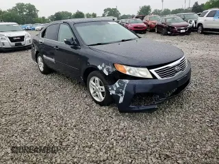 2010 Kia Optima LX z VIN KNAGG4A80A5398981, wystawiony jako Copart lot #59092515 z przebiegiem 153 524 mil mil oraz Szkoda całkowita • Salvage title. Historia ofert i sprzedaży dostępna na DreamBid. Obrazek 13.