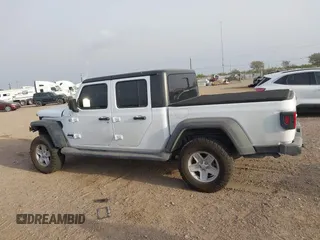 2020 Jeep Gladiator Sport S z VIN 1C6HJTAG5LL141251, wystawiony jako IAAI lot #41825062 z przebiegiem 51 961 mil mil oraz . Historia ofert i sprzedaży dostępna na DreamBid. Obrazek 14.