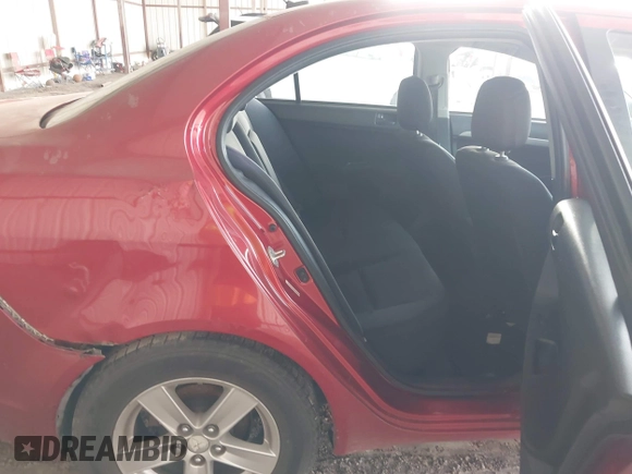 2008 Mitsubishi Lancer DE z VIN JA3AU26U28U042624, wystawiony jako IAAI lot #42257243 z przebiegiem 144 862 mil mil oraz . Historia ofert i sprzedaży dostępna na DreamBid. Obrazek 8.