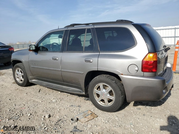 2005 GMC Envoy Denali with VIN 1GKET63M652379567, listed as a Copart auction lot 77862334 with 246,345 mi miles and Non Repairable. Bid and sale history available at carsss.com. Image 2.