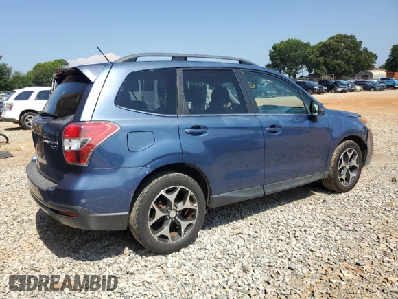 2014 Subaru Forester XT Touring with VIN JF2SJGPC0EH491792, listed as a Copart auction lot 61949315 with 126,304 mi miles and Salvage title. Bid and sale history available at DreamBid. Image 3.