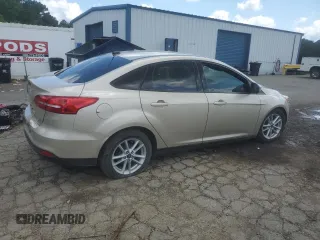 2018 Ford Focus SE with VIN 1FADP3F28JL292624, listed as a Copart auction lot 58960775 with 99,385 mi miles and Salvage title. Bid and sale history available at DreamBid. Image 3.
