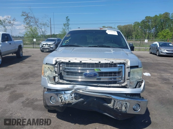 2013 Ford F-150 XL z VIN 1FTFW1CF4DFD63872, wystawiony jako IAAI lot #41948708 z przebiegiem 197 434 mil mil oraz . Historia ofert i sprzedaży dostępna na DreamBid. Obrazek 12.