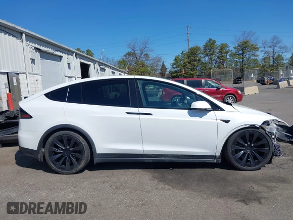 2022 Tesla Model X with VIN 7SAXCDE58NF342776, listed as a IAAI auction lot 42042369 with 70,301 mi miles and . Bid and sale history available at DreamBid. Image 13.