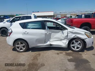 2010 Pontiac Vibe 1SB with VIN 5Y2SL6E04AZ404492, listed as a IAAI auction lot 42496299 with 162,858 mi miles and . Bid and sale history available at DreamBid. Image 6.