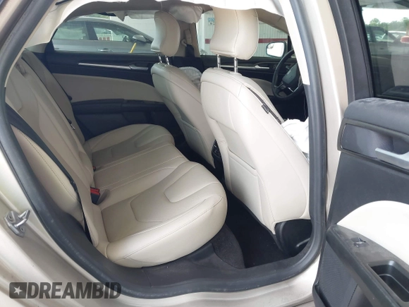 2018 Ford Fusion Titanium с VIN 3FA6P0D98JR268784, выставлен на аукционе IAAI как лот 42257897 с пробегом 145 446 миль миль и . История ставок и продаж доступна на DreamBid. Изображение 8.