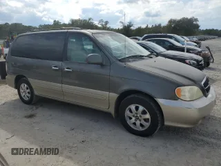 2004 Kia Sedona LX with VIN KNDUP131346575851, listed as a Copart auction lot 73614194 with 153,928 mi miles and Salvage Title. Bid and sale history available at carsss.com. Image 4.