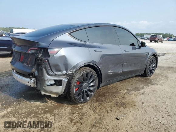 2022 Tesla Model Y Performance with VIN 7SAYGDEF4NF447462, listed as a Copart auction lot 58306595 with 61,671 mi miles and Non repairable. Bid and sale history available at DreamBid. Image 3.