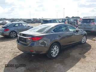2016 Mazda Mazda6 i Sport with VIN JM1GJ1U56G1422012, listed as a IAAI auction lot 40693636 with 93,094 mi miles. Bid and sale history available at carsss.com. Image 4.