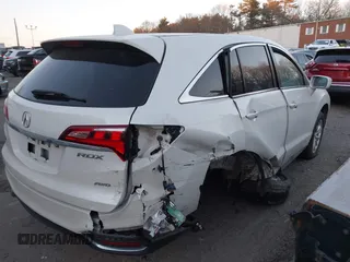 2018 Acura RDX with VIN 5J8TB4H32JL027327, listed as a IAAI auction lot 41246327 with 165,446 mi miles. Bid and sale history available at carsss.com. Image 4.