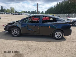 2021 Toyota Prius L Eco with VIN JTDKAMFU3M3140233, listed as a IAAI auction lot 42182685 with 38,842 mi miles and . Bid and sale history available at DreamBid. Image 15.