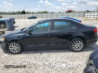 2012 Volkswagen Jetta SE with VIN 3VWDX7AJ3CM064030, listed as a Copart auction lot 62994955 with 185,770 mi miles and Salvage title. Bid and sale history available at DreamBid. Image 2.