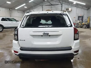 2014 Jeep Compass Sport with VIN 1C4NJDBB3ED773960, listed as a IAAI auction lot 41989986 with 126,875 mi miles. Bid and sale history available at carsss.com. Image 16.