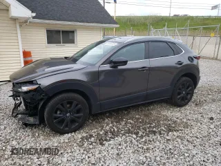 2021 Mazda CX-30 Turbo with VIN 3MVDMBAY7MM307303, listed as a Copart auction lot 58248725 with 54,998 mi miles and Salvage title. Bid and sale history available at DreamBid. Image 1.