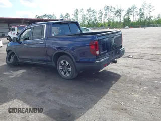 2019 Honda Ridgeline RTL-E with VIN 5FPYK3F76KB010613, listed as a IAAI auction lot 42079810 with 90,492 mi miles and . Bid and sale history available at DreamBid. Image 3.