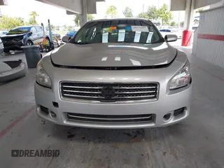 2014 Nissan Maxima SV z VIN 1N4AA5AP6EC463959, wystawiony jako IAAI lot #40179497 z przebiegiem 182 867 mil mil oraz . Historia ofert i sprzedaży dostępna na DreamBid. Obrazek 12.