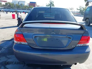 2005 Mitsubishi Lancer ES with VIN JA3AJ26E25U017526, listed as a IAAI auction lot 41680488 with 166,175 mi miles. Bid and sale history available at carsss.com. Image 17.