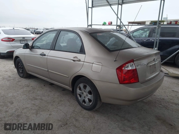 2004 Kia Spectra LX with VIN KNAFE121245064294, listed as a IAAI auction lot 41424241 with 110,136 mi miles. Bid and sale history available at carsss.com. Image 3.