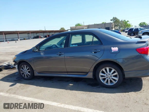 2009 Toyota Corolla with VIN 1NXBU40E69Z034459, listed as a IAAI auction lot 42095649 with 173,296 mi miles. Bid and sale history available at carsss.com. Image 14.