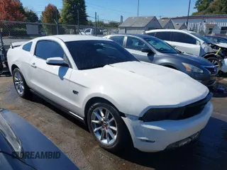 2010 Ford Mustang GT with VIN 1ZVBP8CH3A5132997, listed as a IAAI auction lot 40662577 with 127,127 mi miles. Bid and sale history available at carsss.com. Image 1.