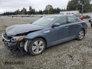 2014 Kia Optima Hybrid EX with VIN KNAGN4AD0E5063891, listed as a Copart auction lot 74816874 with 86,743 mi miles and Salvage Title. Bid and sale history available at carsss.com. Image 1.