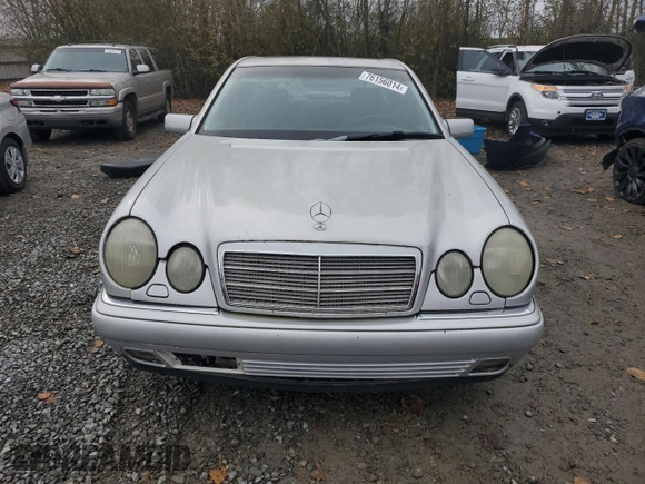 1999 Mercedes-Benz E-Class with VIN WDBJF65H5XA906877, listed as a Copart auction lot 76156014 with 141,956 mi miles and Clean Title. Bid and sale history available at carsss.com. Image 5.