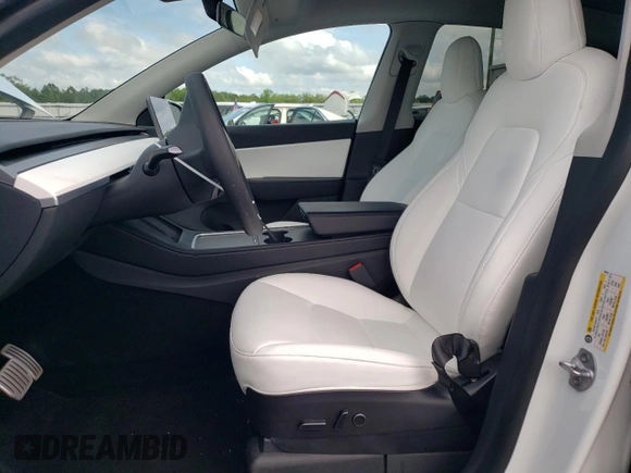 2022 Tesla Model Y Performance z VIN 7SAYGDEF4NF389191, wystawiony jako Copart lot #61443135 z przebiegiem 70 612 mil mil oraz Szkoda całkowita • Salvage title. Historia ofert i sprzedaży dostępna na DreamBid. Obrazek 7.