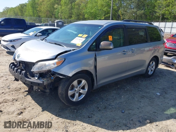 2014 Toyota Sienna LE AAS with VIN 5TDKK3DC4ES466642, listed as a IAAI auction lot 41978930 with 123,084 mi miles. Bid and sale history available at carsss.com. Image 2.
