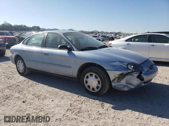 1998 Ford Taurus LX z VIN 1FAFP52U5WA273382, wystawiony jako Copart lot #77102854 z przebiegiem 73 014 mil mil oraz Szkoda całkowita • Salvage title. Historia ofert i sprzedaży dostępna na DreamBid. Obrazek 4.