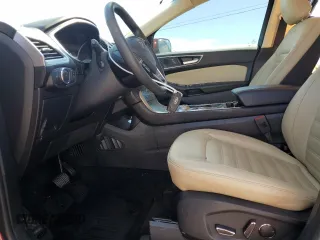 2019 Ford Edge SEL with VIN 2FMPK3J91KBC43725, listed as a Copart auction lot 56749525 with 62,858 mi miles and Salvage title. Bid and sale history available at DreamBid. Image 7.